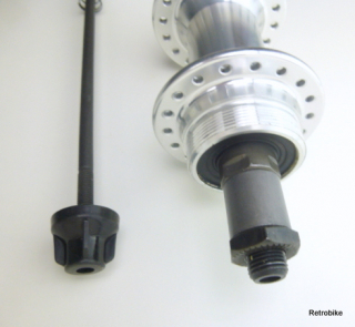 Preview: Quando Hinterrad Nabe Speiche 36 Loch Schnellspanner quick release Schraubkranz BSA 7 fach Rennrad