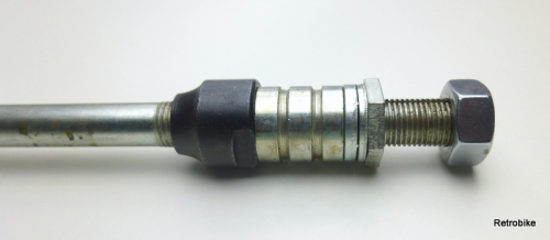 Bicycle rear wheel solid axle FG 9.5 threaded rod 3/8" x 26 length 165mm cone black spacer lock nut axle nut silver set